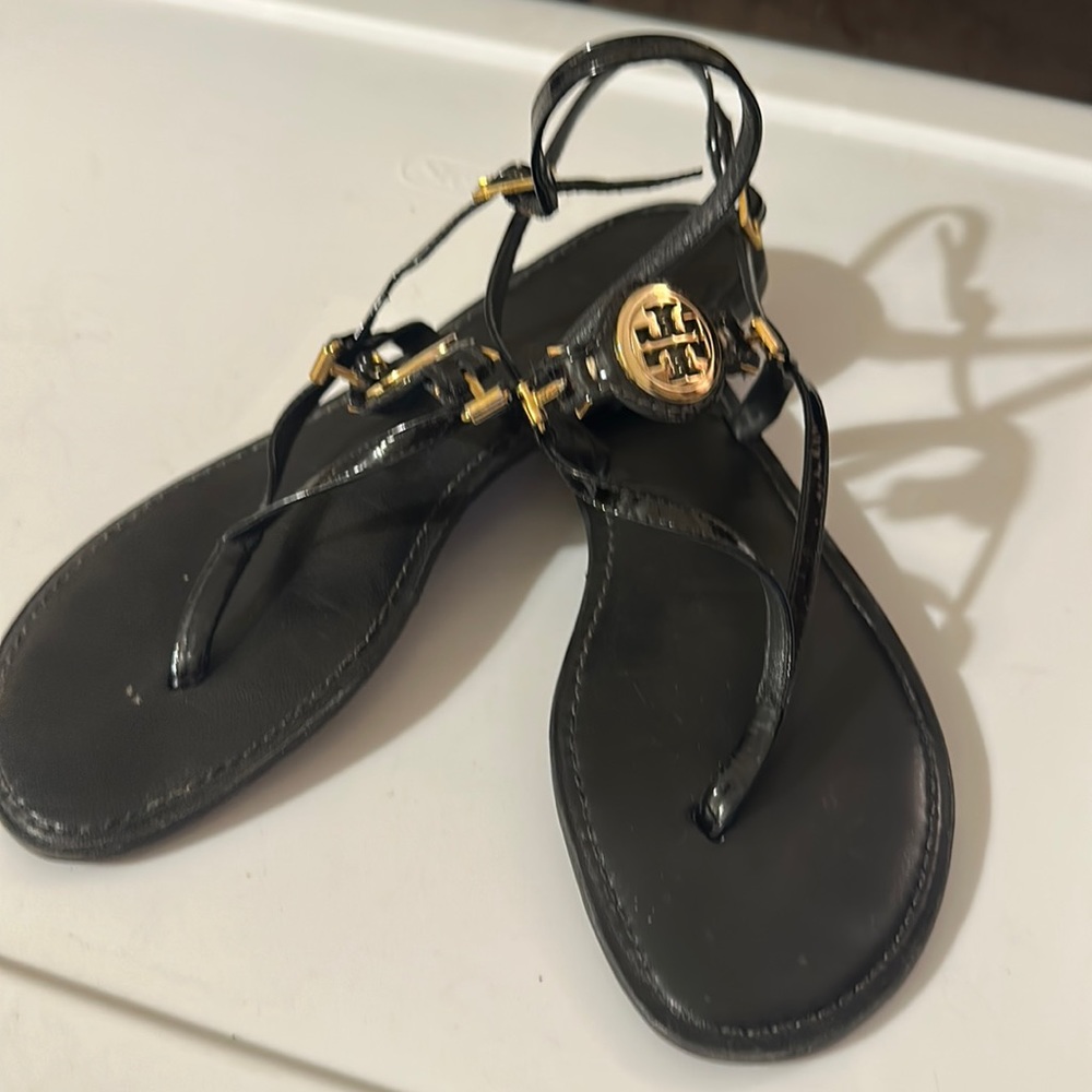 Tory Burch T strap black patent leather sandals